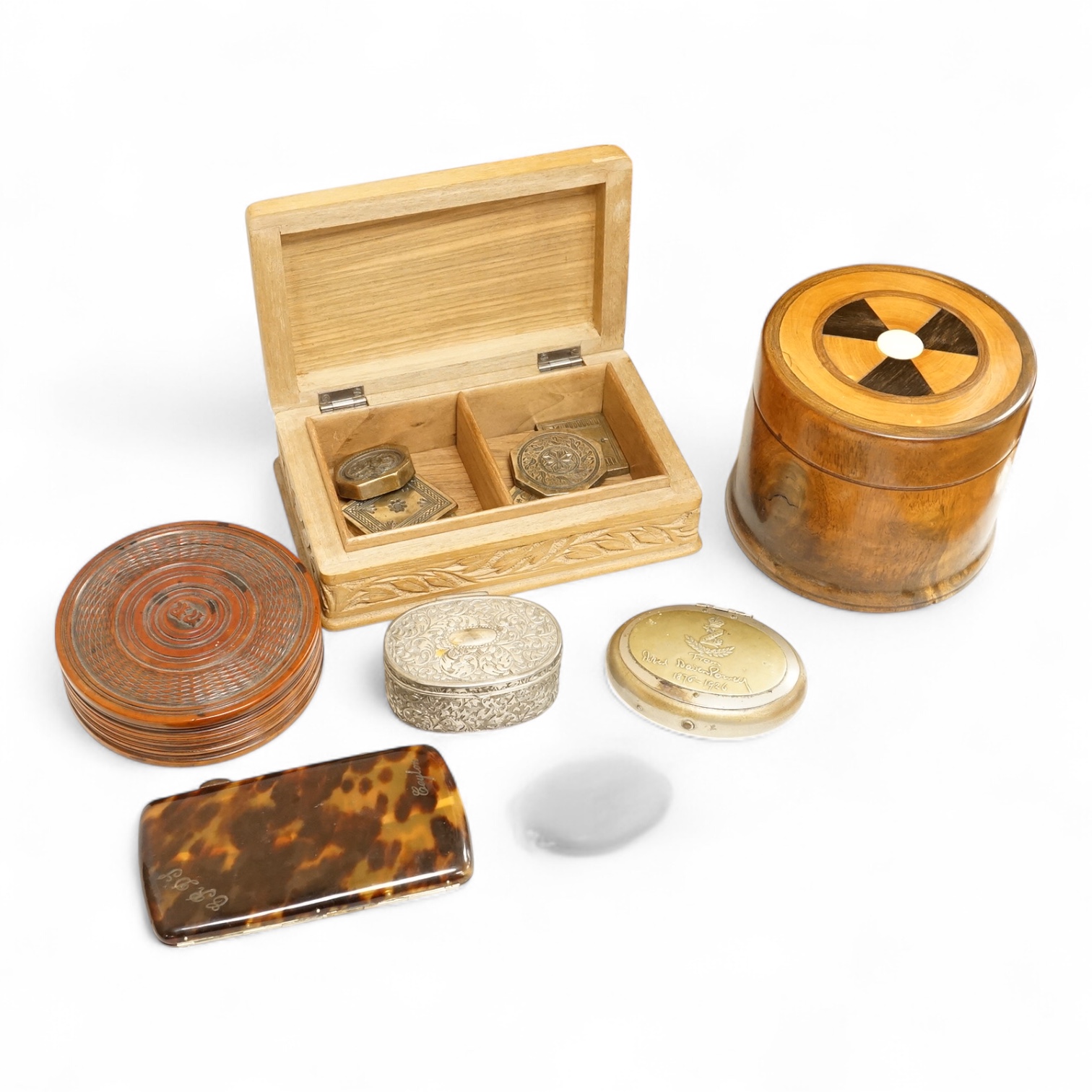 Two treen boxes, a cigarette box, a tortoiseshell box, a military tobacco box, a plated box and various decorative metal panels, CITES Submission reference, KPXPJXQU